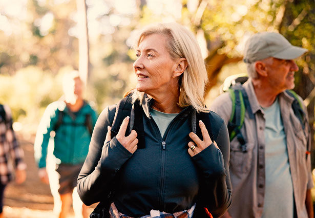 Couple walking in the woods